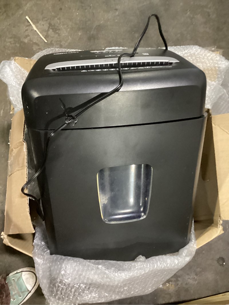 Condition photo showing Good Condition for Amazon Basics 12 Sheet (new model) Micro Cut Paper and Credit Card CD Shredder With 6 Gallon Bin, Black