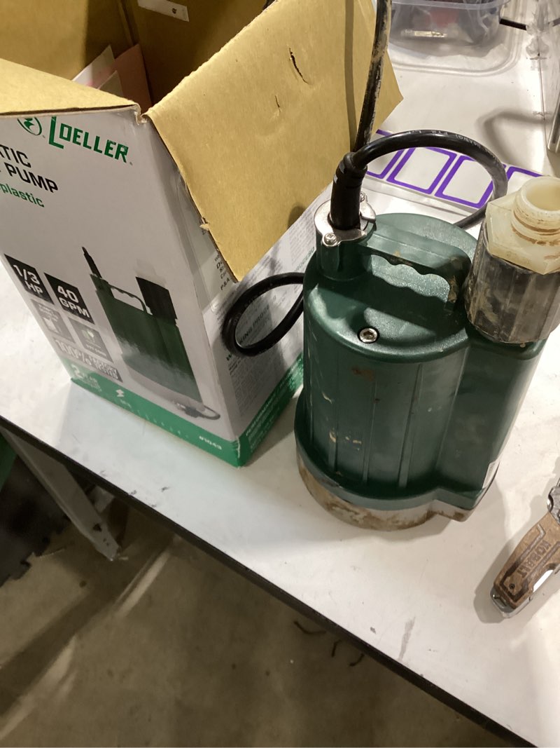 Condition photo showing As Is for zoeller 1/3 hp 2100 gph thermoplastic electronic switch bottom ac submersible utility pump