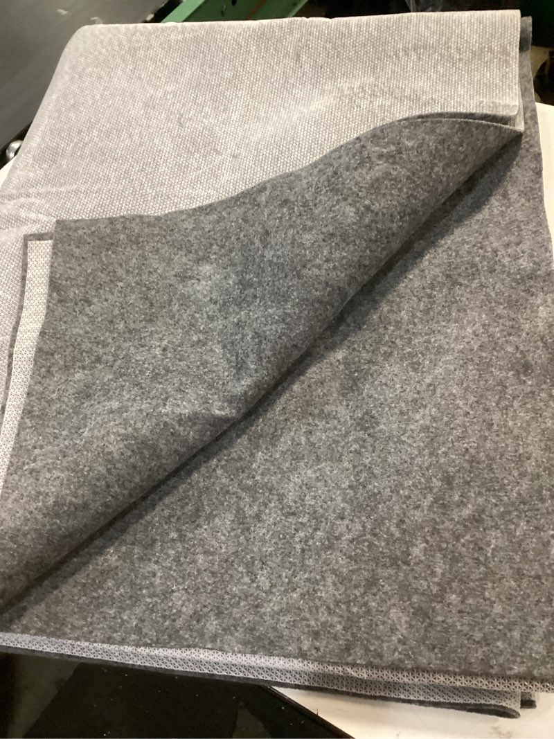 Condition photo showing As Is for non slip rug pad grippers - 7x10 ft, 1/8" thick, (felt + rubber) double layers area carpet mat tap, provides protection and cushioning for hardwood or tile floors
