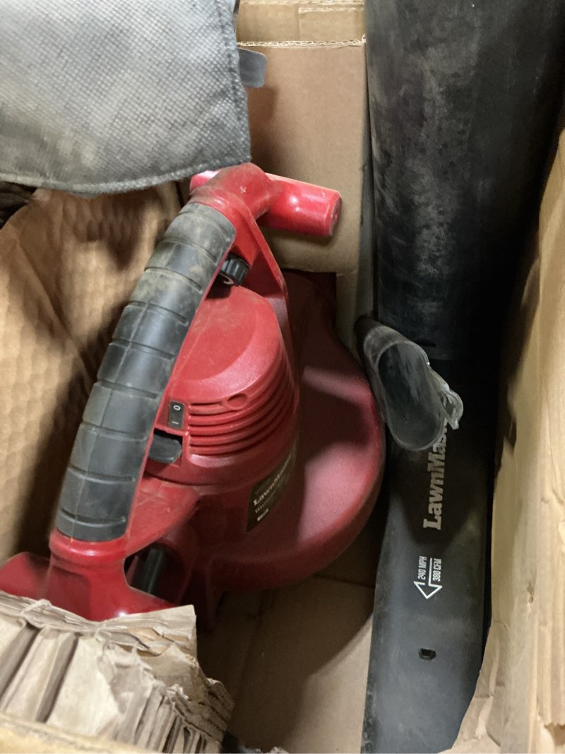 Condition photo showing As Is for lawnmaster red edition bv1210e 1201 electric blower vacuum mulcher 12 amp variable speed with metal impeller 240 mph 380 cfm 16:1 mulch ratio