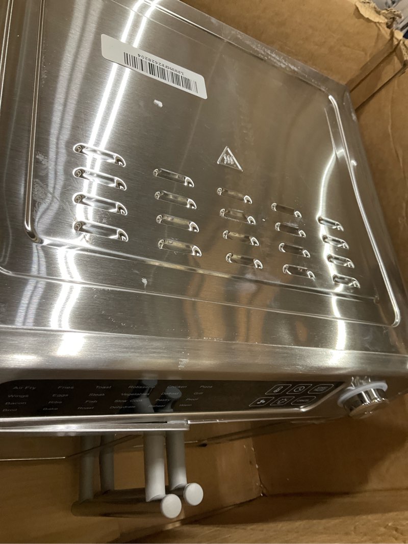 Condition photo showing As Is for Dan - Emeril Lagasse Extra Large French Door Air Fryer Toaster Oven Combo, 24 Cooking Functions and Digital Controls, 7 Accessories Included, Stainless Steel Finish, 26QT Capacity
