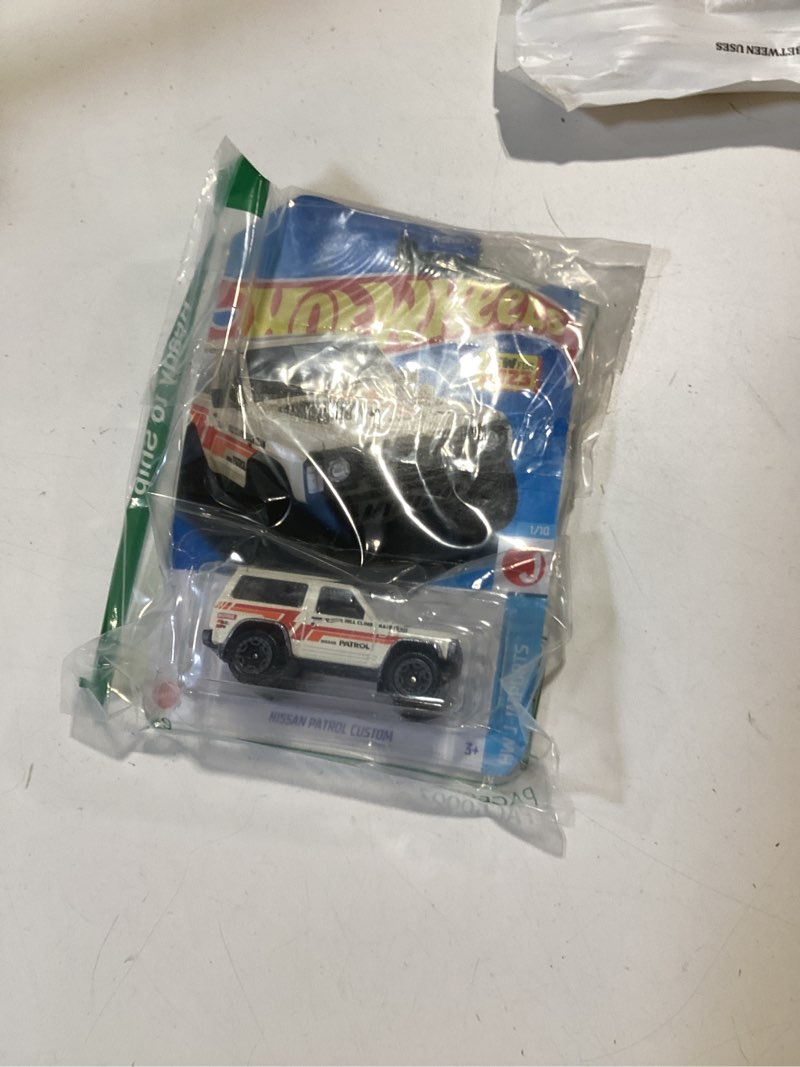 Condition photo showing New/Like New for hot wheels nissan patrol custom, hw j-imports 1/10