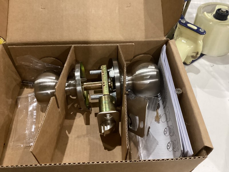 Condition photo showing As Is for Amazon Basics Exterior Door Knob With Lock, Coastal, Satin Nickel