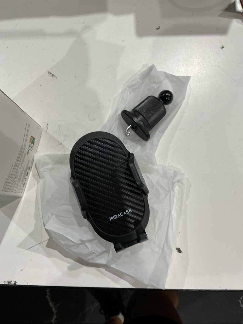 Condition photo showing Good Condition for miracase phone holders for your car with metal hook clip, air vent cell phone stand car mount, universal automobile cradle for garmin gps fit iphone android and all smartphones, dark black dark black 1 pack