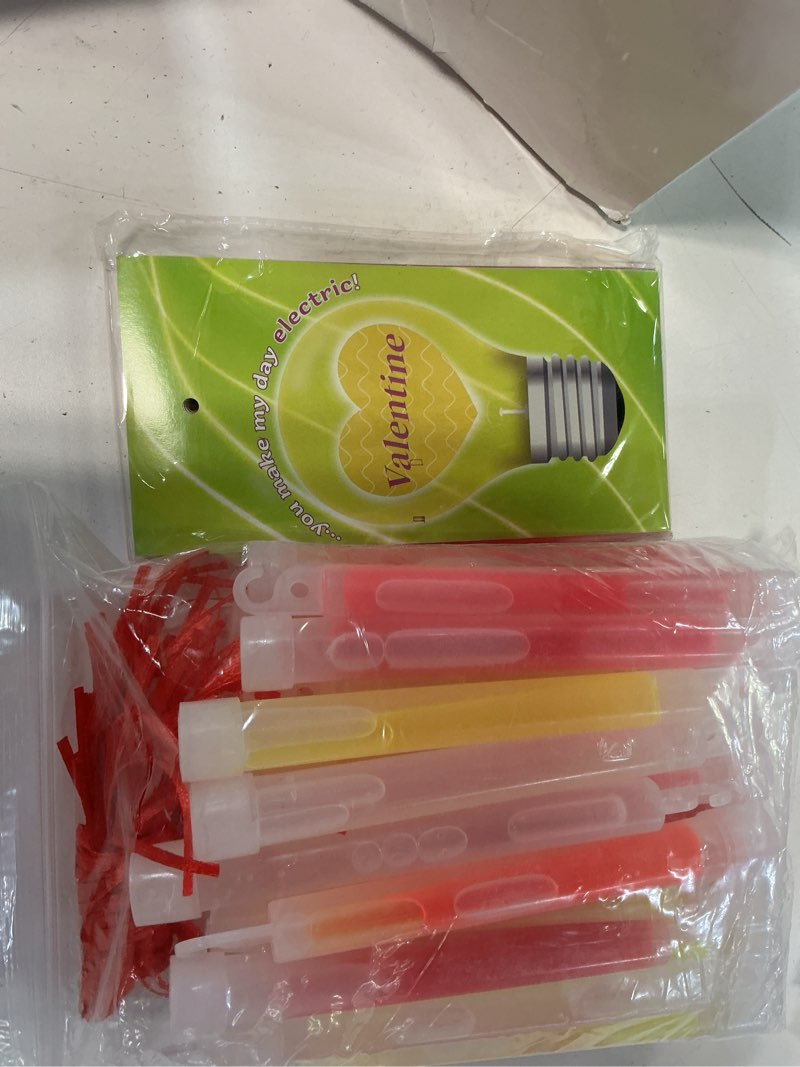 Condition photo showing New/Like New for 36 Packs Valentines Day Gift Cards with Bright Large Glow Stick, Neon Glow in the Dark Sticks for Valentine's Party Favor, Classroom Exchange Cards, School Prize