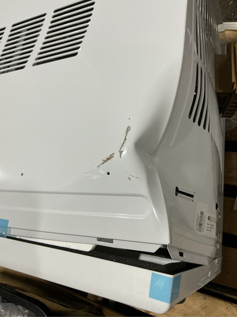 Condition photo showing As Is for ge large room window air conditioner with heater, remote included ( 240-volt , 12200-btu )