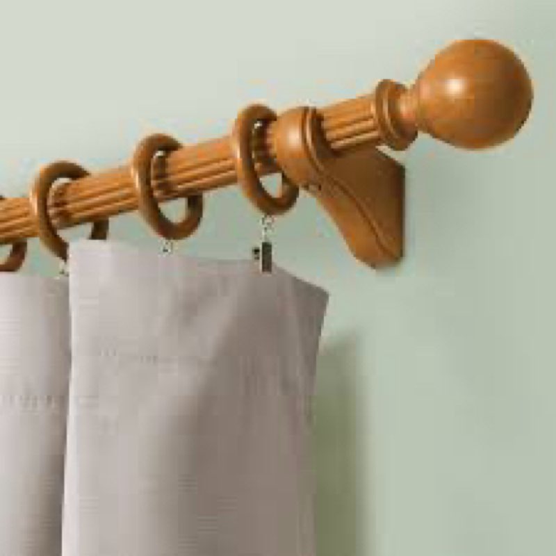 assorted curtain rods and shower curtain rods