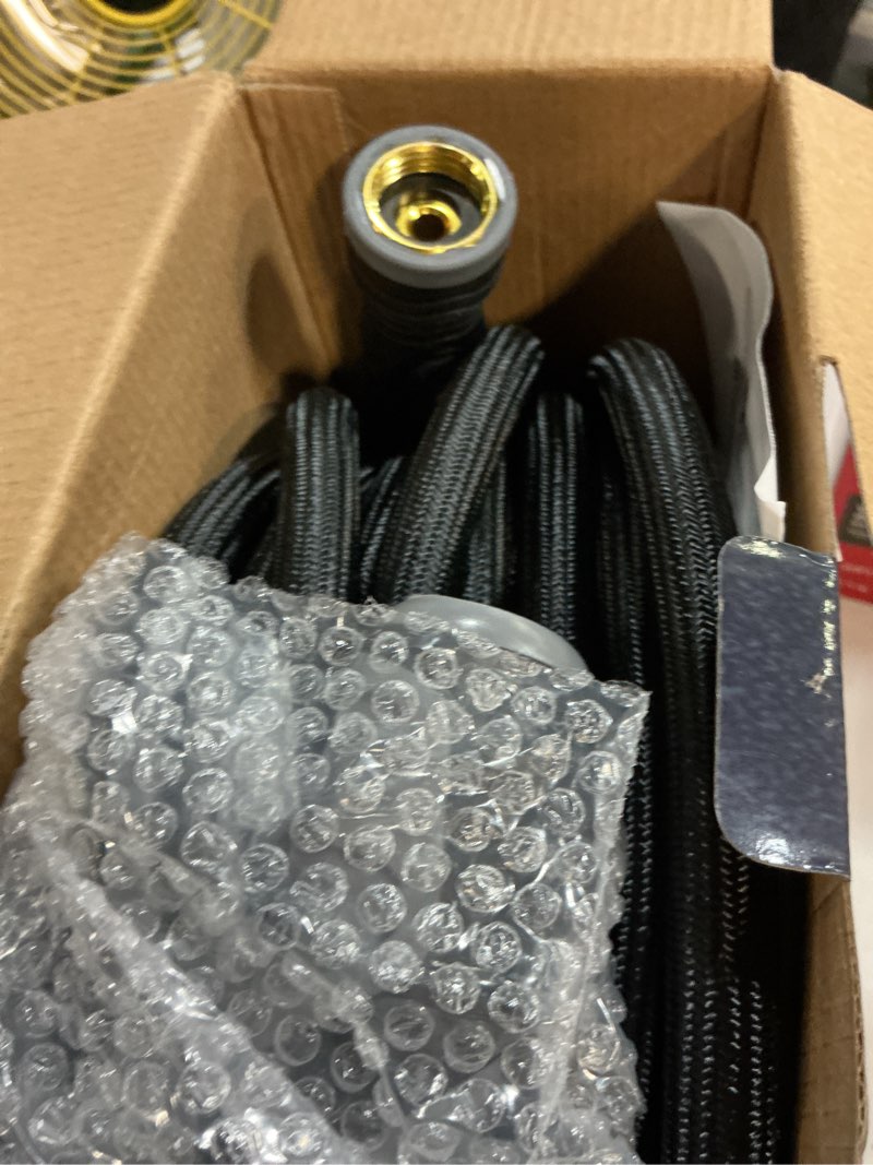 Condition photo showing New/Like New for relxitl garden hose, flexible water hose, ultra lightweight non-expanding hose with 10 function sprayer, leak proof, pressure resistant for yard, outdoor (black, 100ft) 100ft black