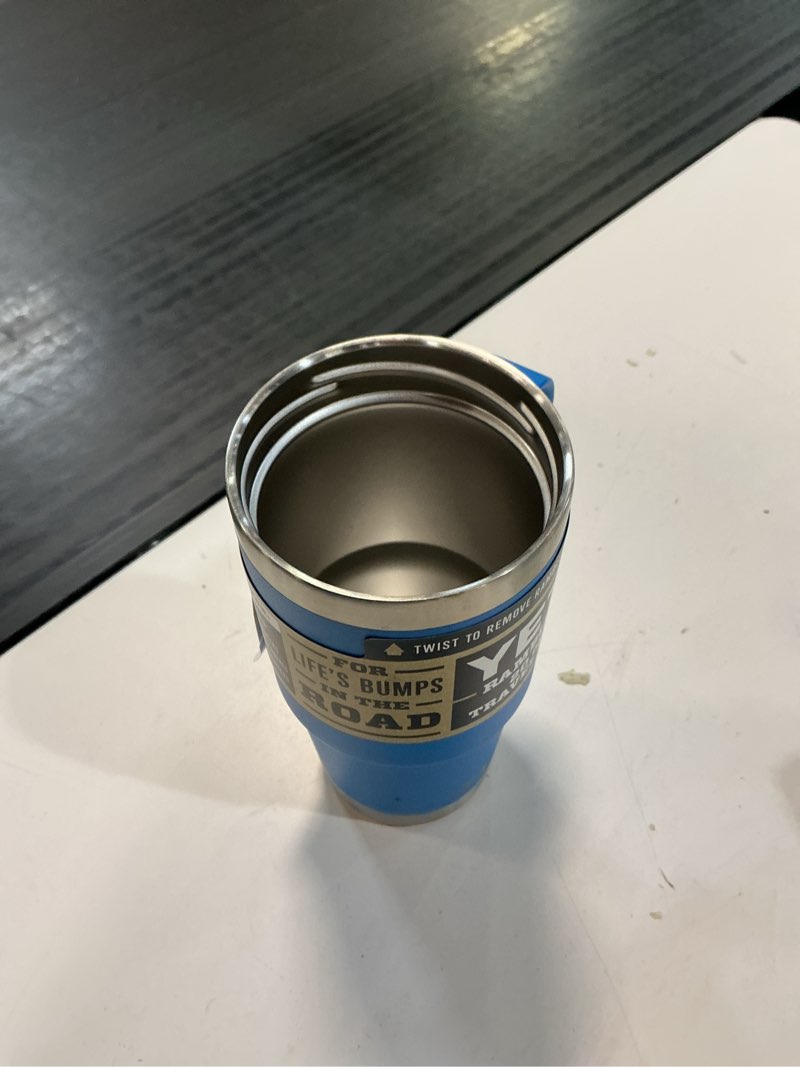 Condition photo showing As Is for yeti rambler 20 oz travel mug, stainless steel, vacuum insulated with stronghold lid big wave blue