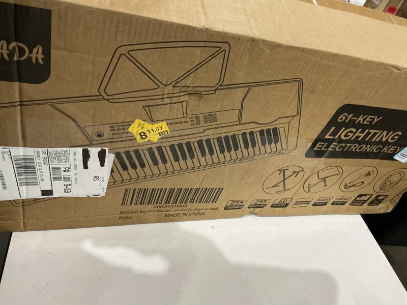 Condition photo showing New/Like New for 61 key portable electronic keyboard piano w/lighted full size keys, lcd, headphones, x-stand, stool, music rest, microphone, note stickers, built-in speakers,3 teaching modes