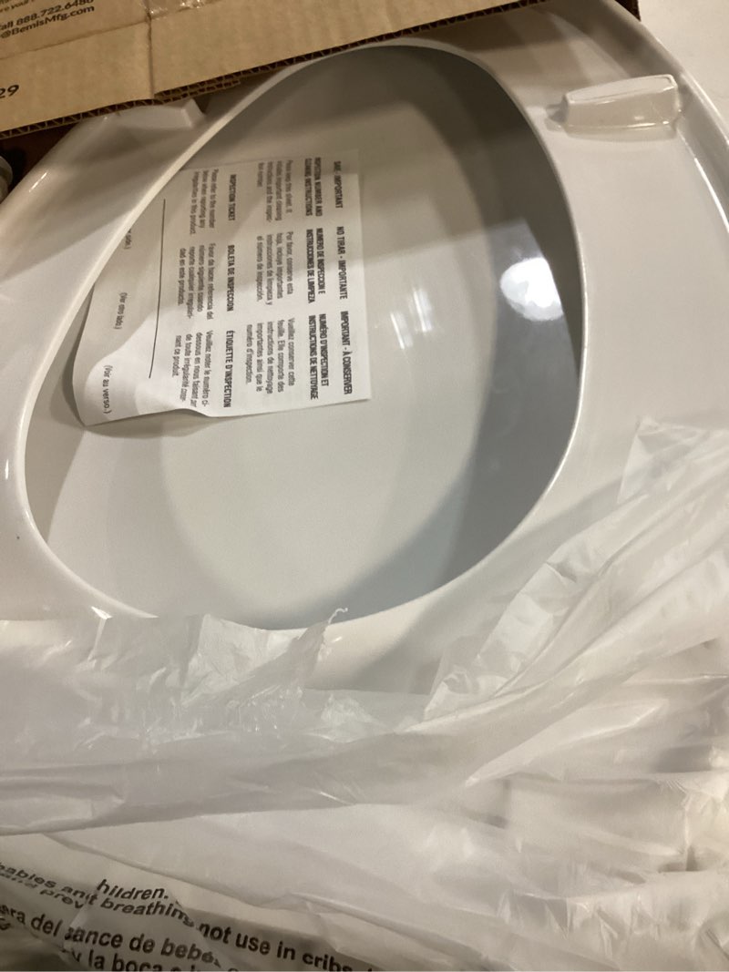 Condition photo showing As Is for mayfair little2big? elongated plastic toilet seat in white with sta-tite? seat fastening system? and whisper•close? hinge