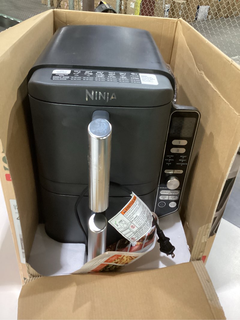 Condition photo showing As Is for ninja air fryer, 10qt doublestack xl 2-basket, compact design, cooks 5lb whole chicken, feeds up to 8 people, 6-in-1 air fryer, roast, bake & more, easy to clean, dishwasher safe parts, grey, sl401 10 qt, not tested
