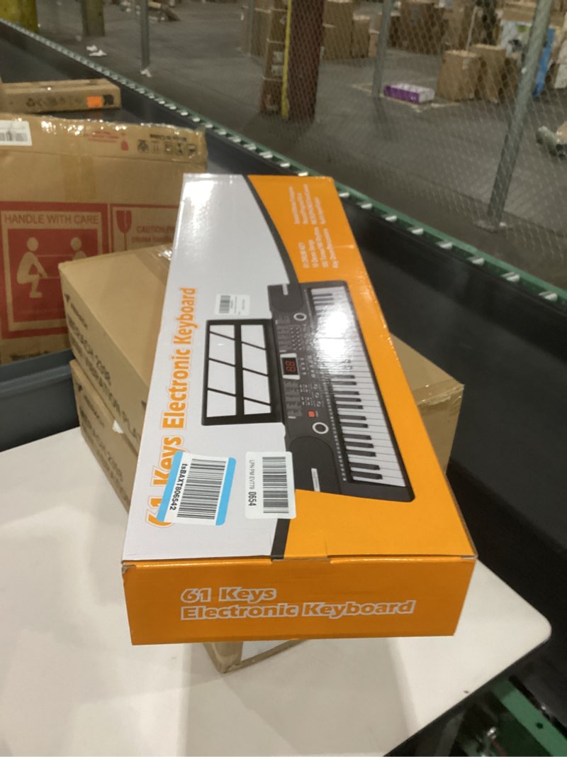 Condition photo showing New/Like New for 61 keys keyboard piano, Electronic Digital Piano with Built-In Speaker Microphone, Sheet Stand and Power Supply, Portable piano Keyboard Gift Teaching for Beginners Black