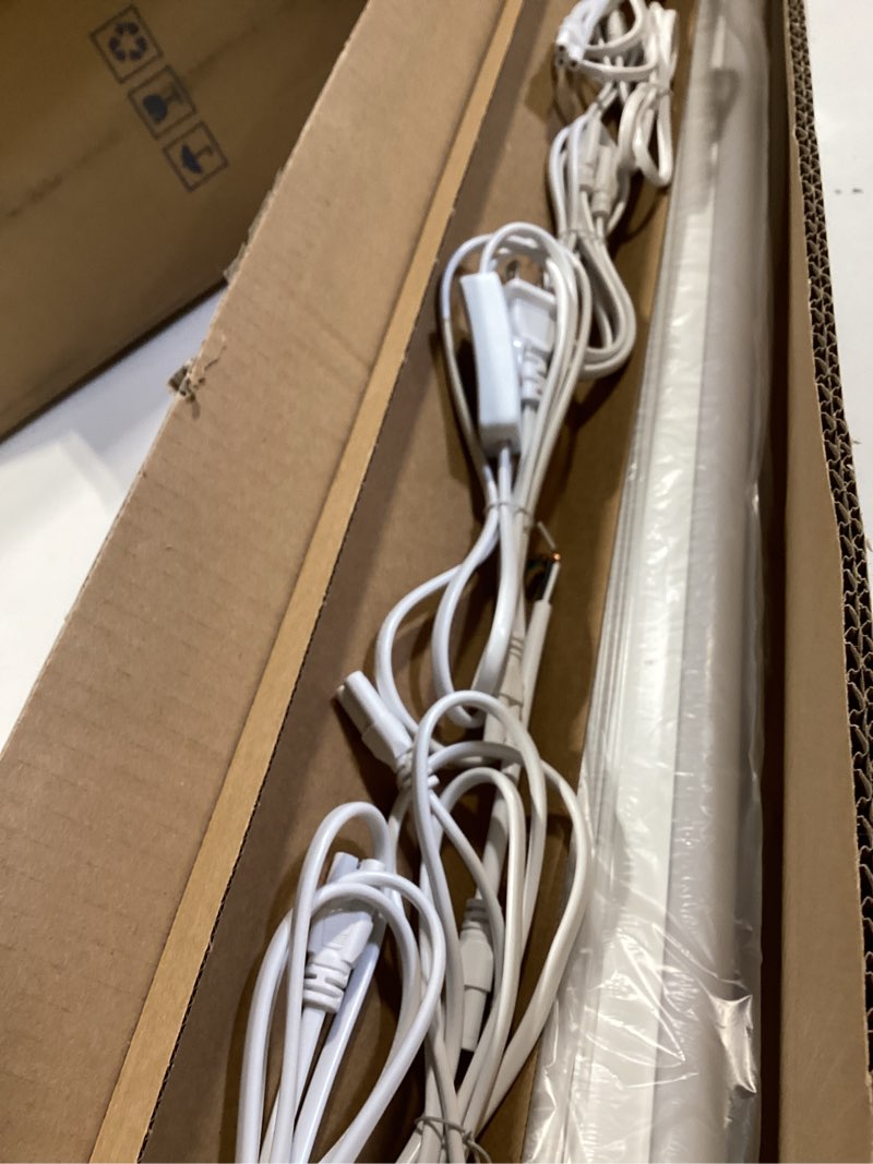 Condition photo showing Good Condition for pak 4ft led shop lights, 2300lm 6500k cool white, 20w energy efficient linkable ceiling and under cabinet lighting, t5 integrated utility fixture for garage, workshop, basement, fcc certified, 4 pack white 4ft 6500k-4 pack