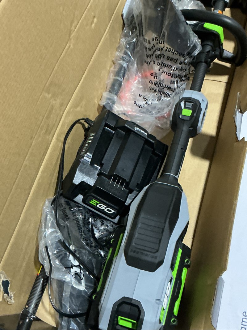 Condition photo showing Good Condition for ego power+ multi-head system with line iq, powerload 56-volt 17-in straight shaft attachment capable battery string trimmer 5 ah (battery included) (charger included)