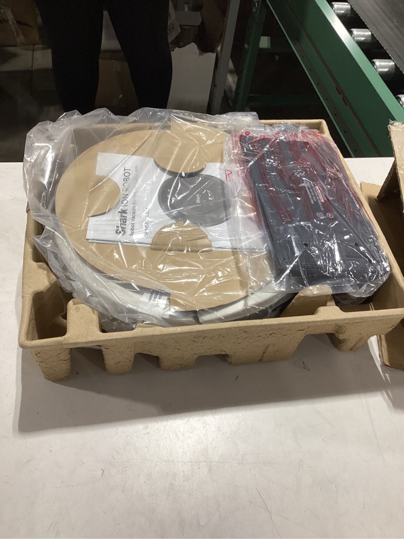 Condition photo showing As Is for Shark AV753 ION Robot Vacuum, Tri-Brush System, Wifi Connected, 120 Min Runtime, Works with Alexa, Multi Surface Cleaning, Grey ION Robot (Grey)