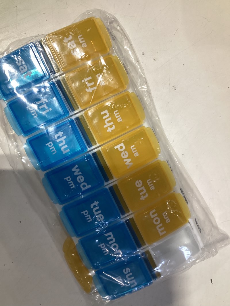 Condition photo showing As Is for ezy dose weekly am/pm pill organizer, 7-day vitamin and medication box with large pop-out compartments, 2 times a day pill holder for easy dosing, yellow and blue lids, travel-friendly design blue and yellow large