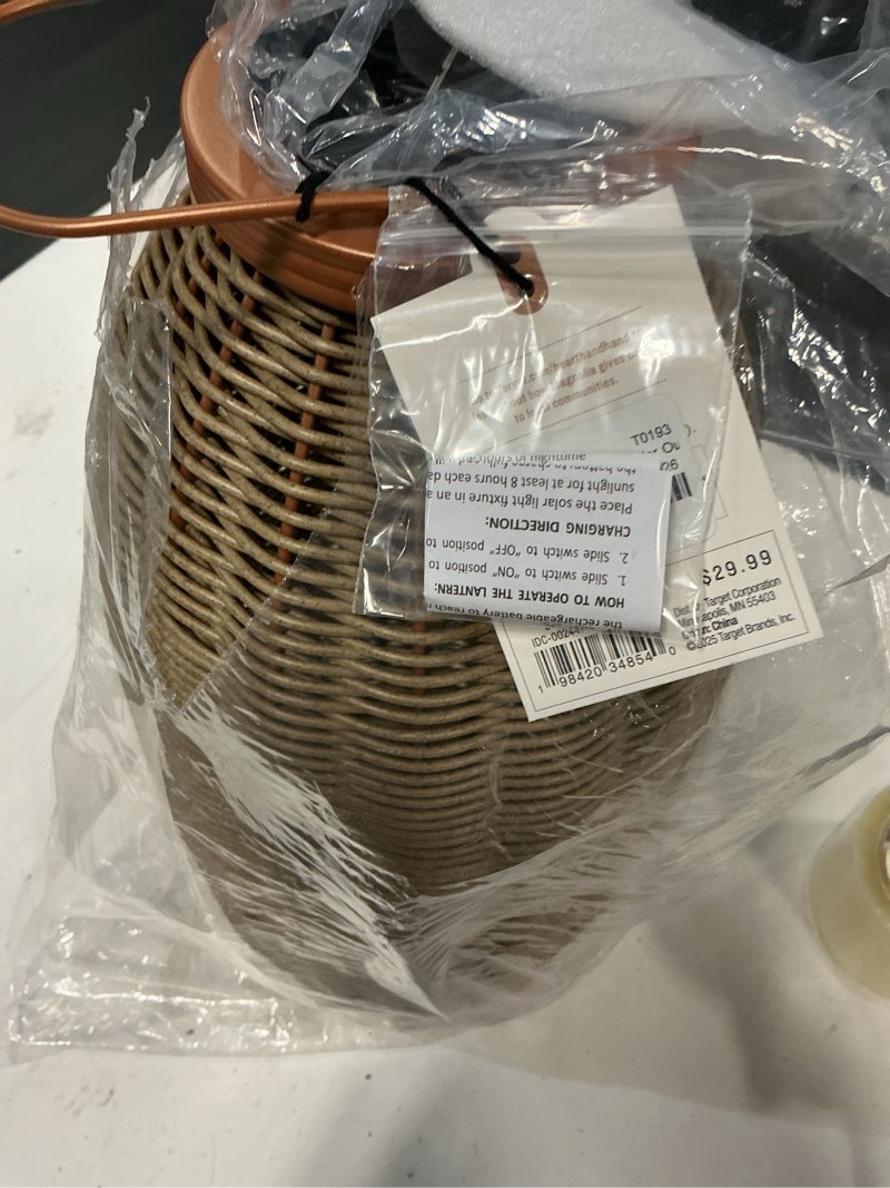 Condition photo showing New/Like New for 18" rattan solar outdoor patio lantern - hearth & hand™ with magnolia