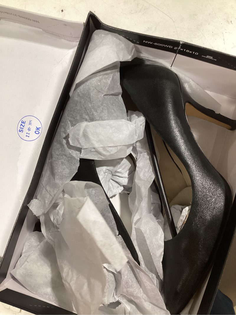 Condition photo showing As Is for nine west flax pump 7 black leather used