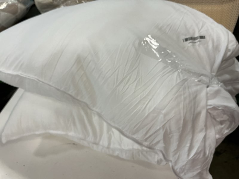 Condition photo showing As Is for Amazon Basics Down Alternative Bed Pillows, Medium Density For Back and Side Sleepers, King, 2-Pack, White, 36 in L x 20 in W King (Pack of 2) Medium