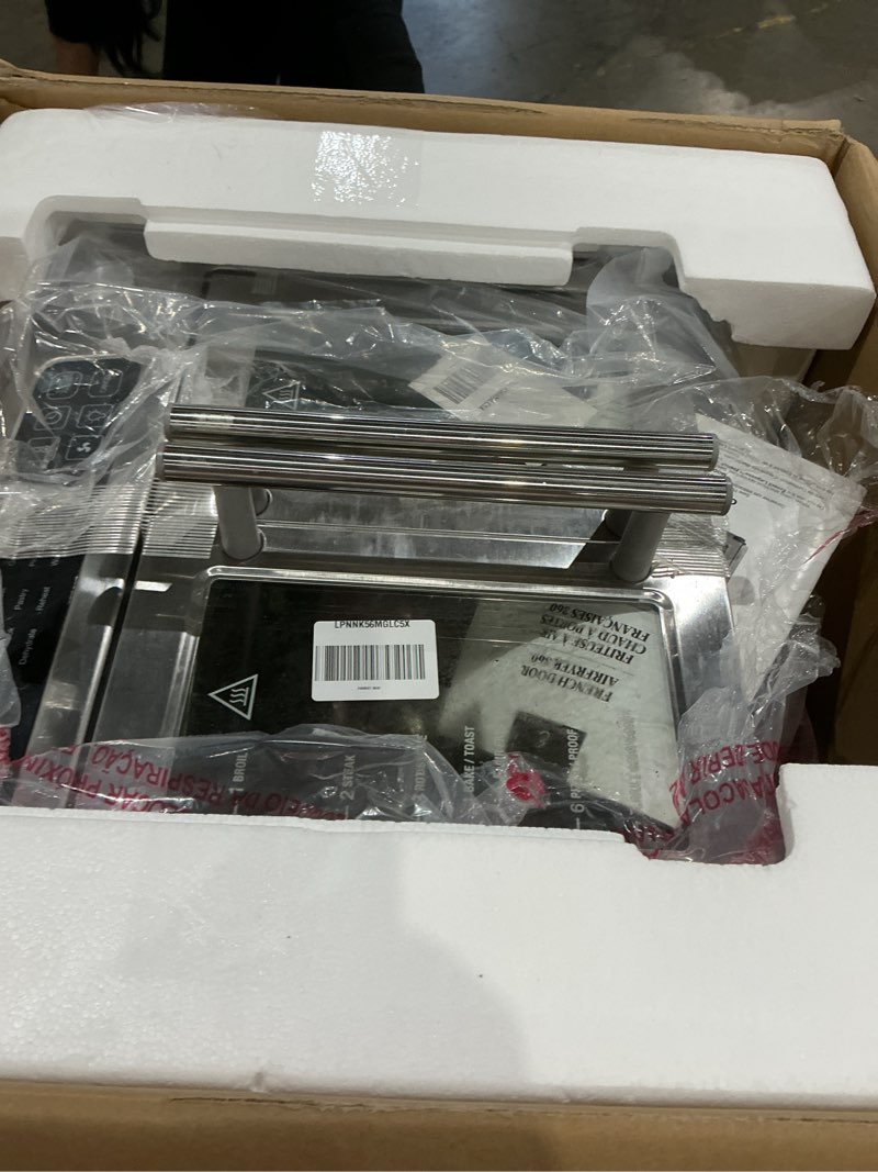 Condition photo showing As Is for dan - emeril lagasse extra large french door air fryer toaster oven combo, 24 cooking functions and digital controls, 7 accessories included, stainless steel finish, 26qt capacity
