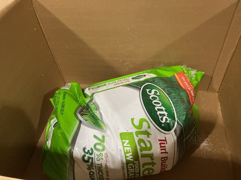 Condition photo showing As Is for Scotts Turf Builder Starter Fertilizer for New Grass, Use When Planting Seed, 14,000 sq. ft., 42 lbs. Standard 14,000 sq. ft.