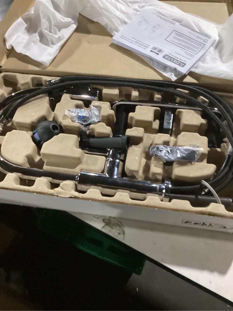 Condition photo showing As Is for Delta Nicoli Chrome Kitchen Faucet with Pull Down Sprayer, Modern Single Hole Kitchen Sink Faucet, Single Handle, Chrome 19867LF