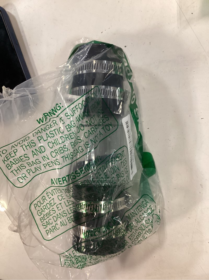 Condition photo showing New/Like New for 1-1/2 inch silent sump pump check valve, spring-loaded quiet check valve for backflow prevention, clear body with stainless steel clamps, fits 1-1/2” pipe