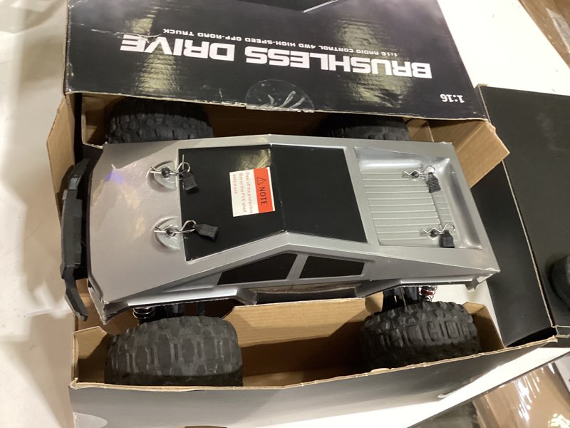 Condition photo showing As Is for 1/16 brushless fast rc cars for adult, 35mph high speed remote control car, cyber rc truck, 4x4 monster truck toy, 2.4ghz remote, all terrain off-road vehicle, colorful led light, kids gift