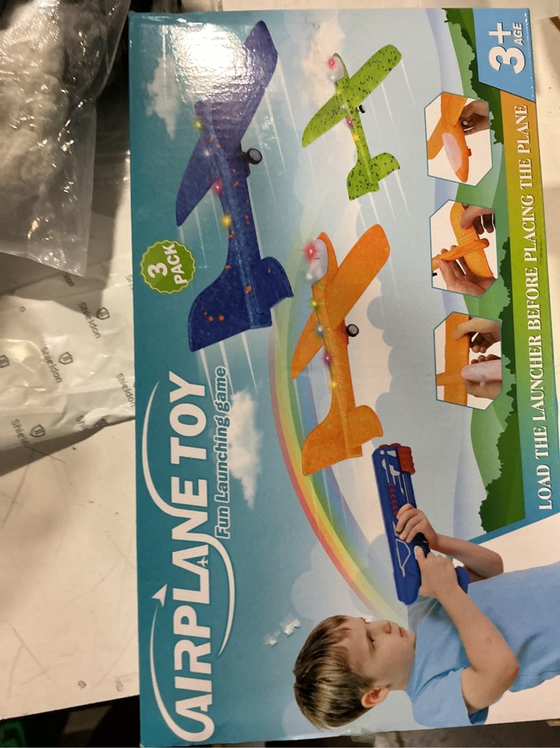 Condition photo showing Good Condition for Fuwidvia 3 Pack Airplane Launcher Toys, 13.2'' LED Foam Glider Plane Toy for Boys, 2 Flight Modes Outdoor Flying Toys Birthday Gifts for Boys Girls 4 5 6 7 8 9 10 11 12 Year Old (Blue&Green&Orange)