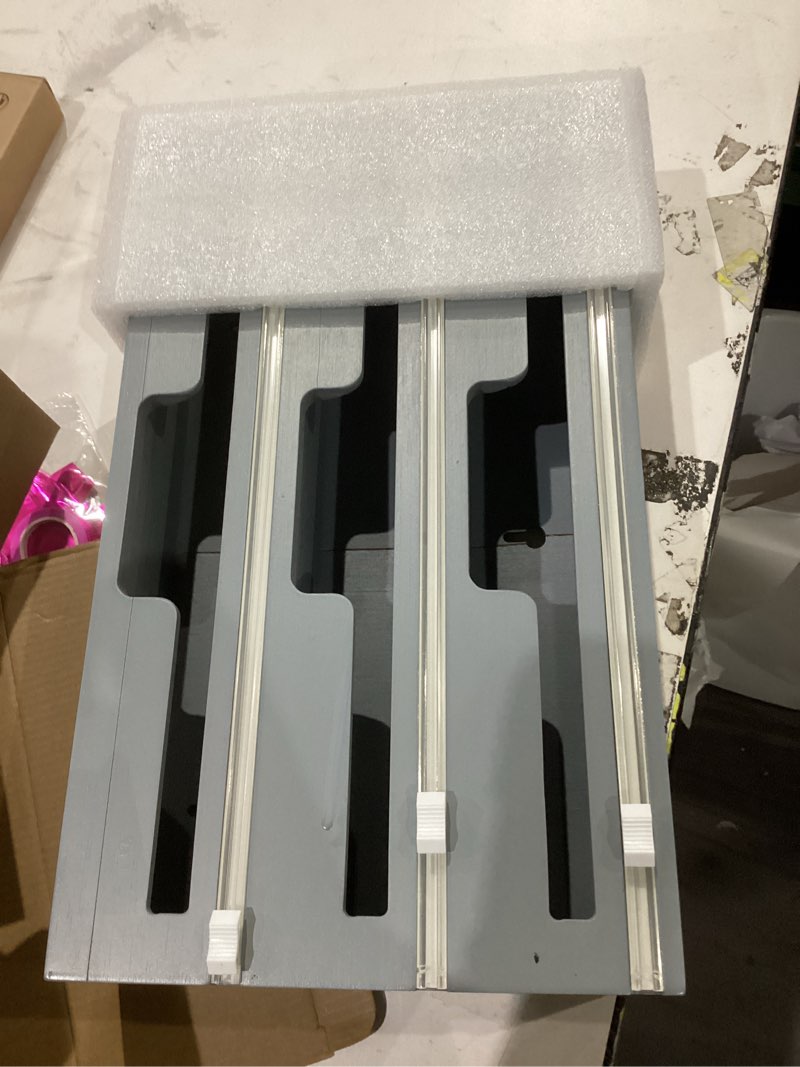 Condition photo showing Good Condition for spaceaid wrapneat 3 in 1 wrap organizer with cutter and labels, plastic wrap, aluminum foil and wax bamboo dispenser for kitchen storage organization holder for 12" roll (gray) 3-slot, 3"tall 04 gray