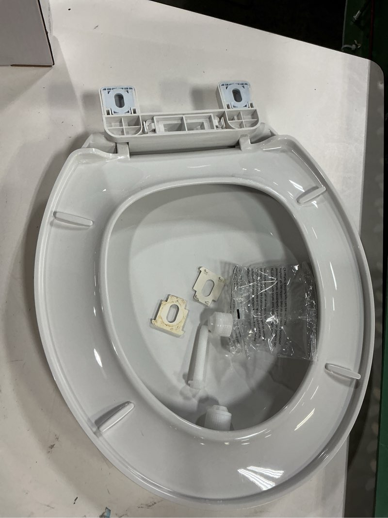 Condition photo showing Good Condition for american standard mightytuff plastic white round soft close toilet seat