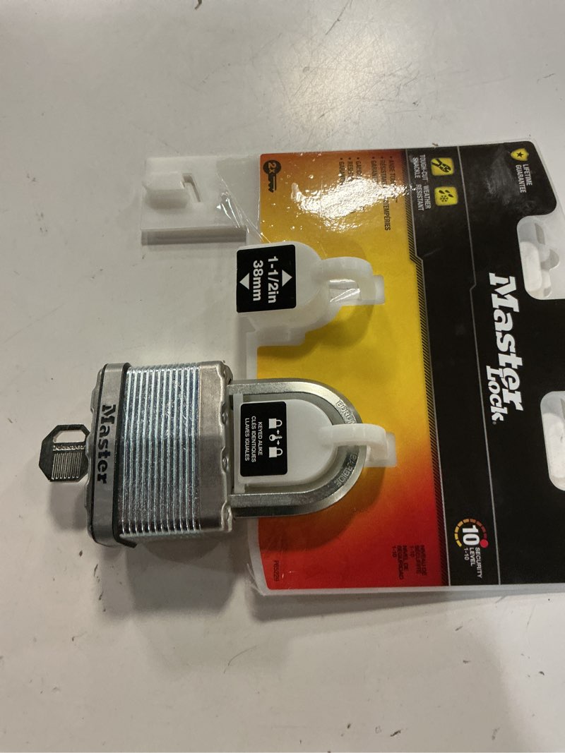 Condition photo showing As Is for master lock magnum 1.6 in. h x 2-1/2 in. w steel key weather-resistant padlock