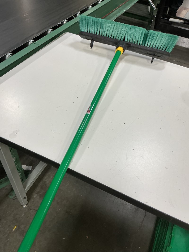 Condition photo showing As Is for quickie bulldozer multi-surface push broom 18 inch, green, steel handle with swivel hang-up feature, indoor and outdoor cleaning, sweep sidewalks/warehouses, dirt, debris