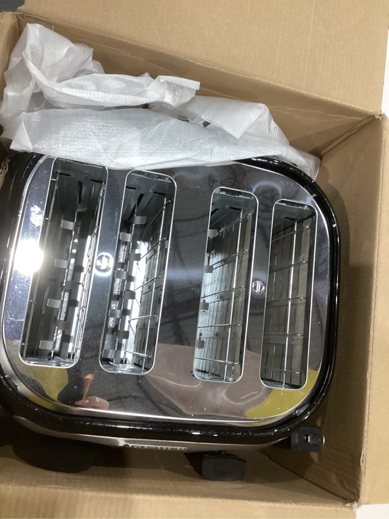 Condition photo showing Good Condition for BLACK+DECKER 4-Slice Toaster, Extra Wide Slots, 7 Shade Settings, 1400 Watts, Frozen and Bagel Buttons, Toast Shade Selector, Extra Lift 4-Slice Black