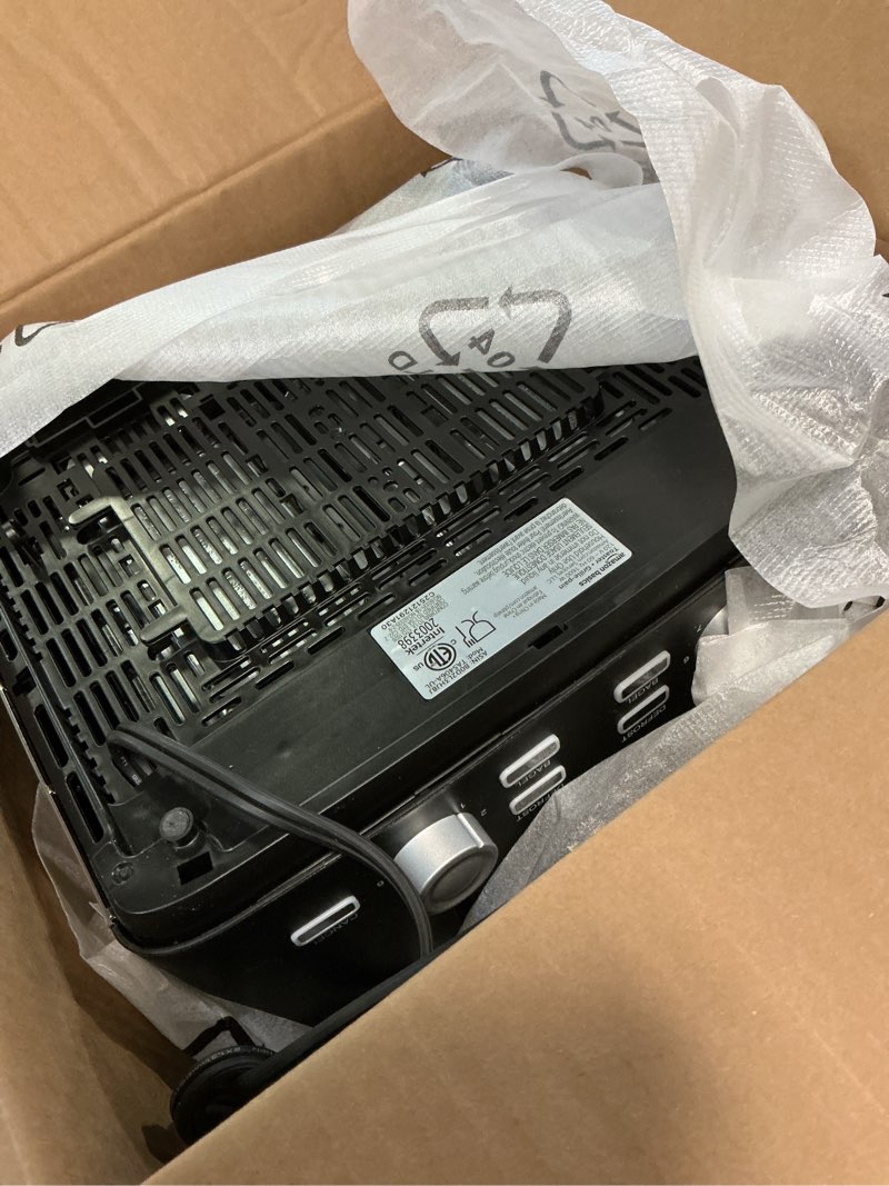 Condition photo showing Good Condition for amazon basics 4 slice toaster, with 7 browning settings, extra wide slots for bagels and special breads, removable easy-to-clean crumb trays, cancel/defrost/bagel buttons, 1500w, black & silver 4 slice matte black front