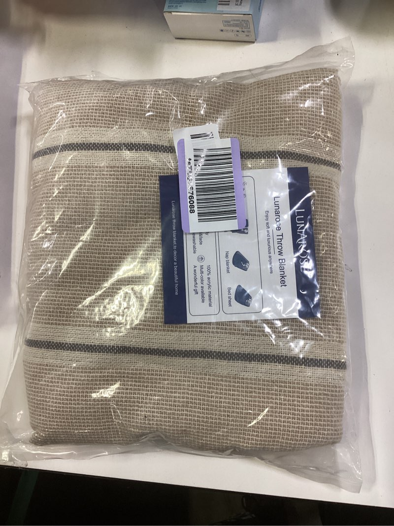 Condition photo showing New/Like New for Lunarose Throw Blanket for Couch,Soft Cozy Knit Blanket,Lightweight Decorative Throw for Sofa Chair Bed Travel and Living Room-All Seasons Suitable for Women,Men and Kids (Beige, 60x80) Beige 60" x 80"
