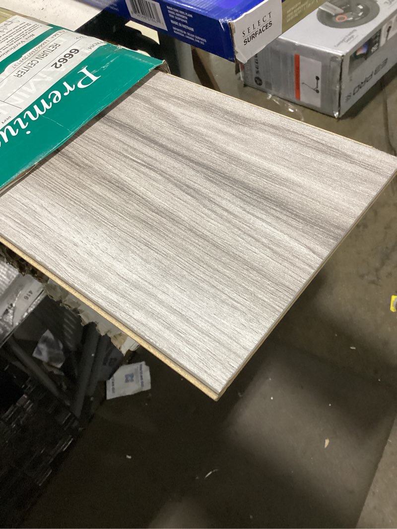 Condition photo showing Good Condition for select surfaces southern gray spill defense laminate flooring