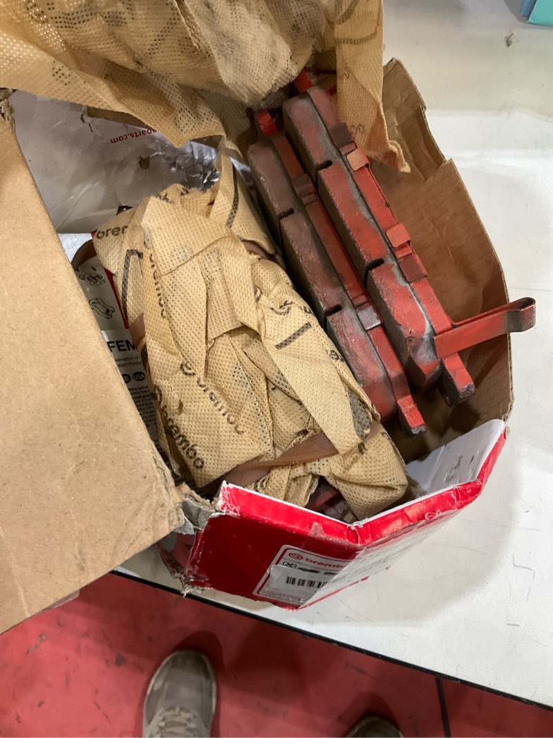 Condition photo showing As Is for brembo p28098n premium ceramic front disc brake pad set honda oe# 45022tlaa01