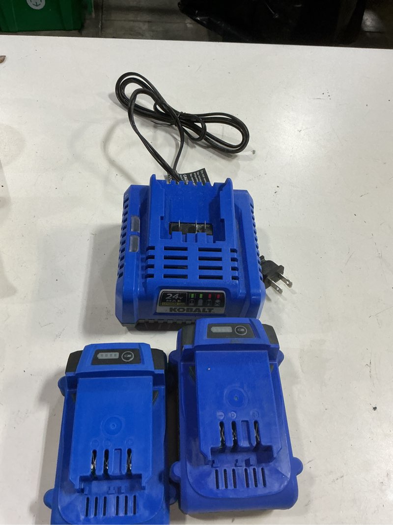Condition photo showing As Is for k.balt 24-v lithium-ion battery and charger (2 ah)