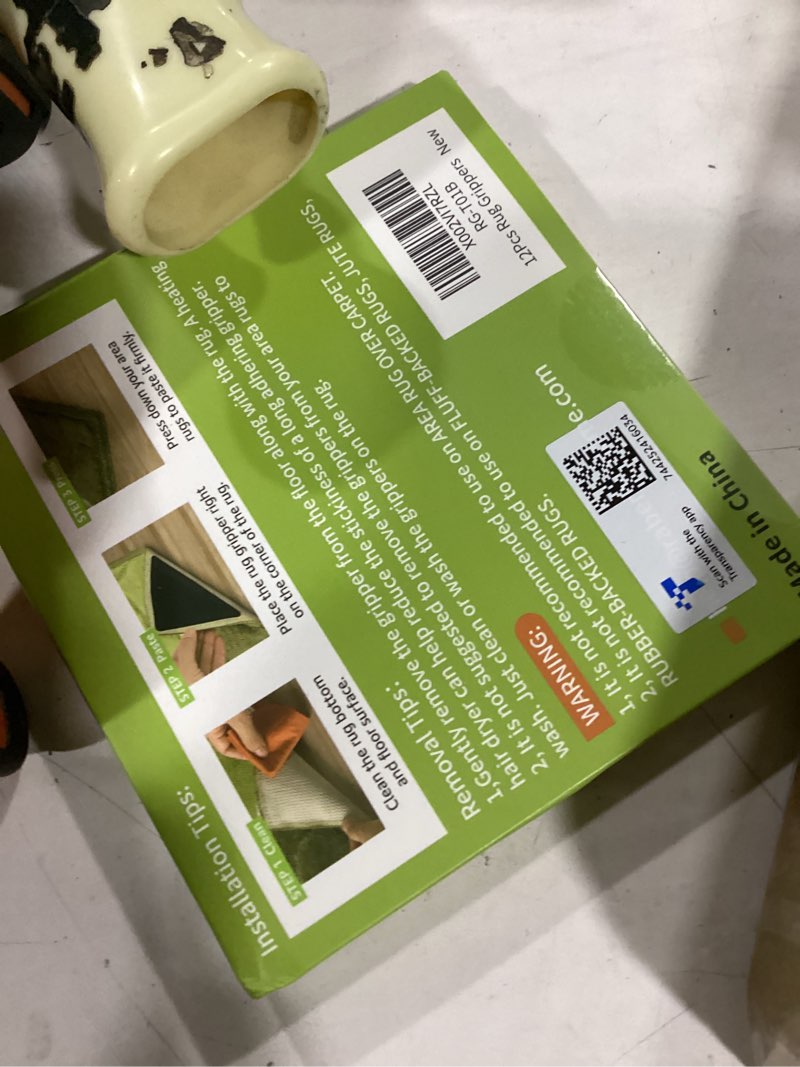 Condition photo showing Good Condition for Rabenda 12 Pcs Rug Tape, Non Slip Rug Pads Grippers for Hardwood Floors and Tiles, Reusable Carpet Tape for Area Rugs, Double-Sided Adhesive Rug Stickers Keep Corners Flat (Black)