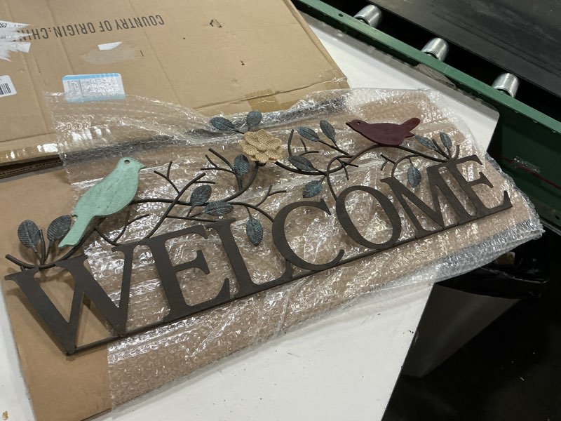 Condition photo showing New/Like New for birds on branch welcome sign metal wall art, 26.5" x 11"