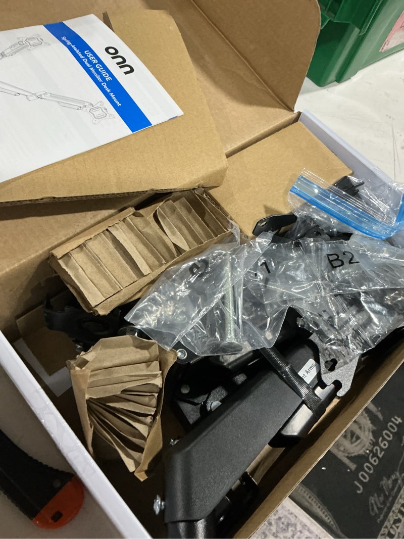 Condition photo showing As Is for onn dual monitor desk mount for 13"-32" monitors, spring-assisted adjustable arms, vesa compatible, holds up to 19.8 lbs