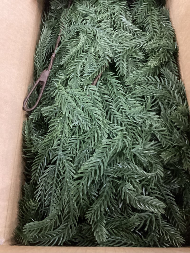Condition photo showing Good Condition for 2 Pack Christmas Norfolk Pine Garlands 6FT, Real Touch Artificial Greenery Garland – Full Evergreen Pine Garland for Mantle, Fireplace, Table, Wall, Stairs & Outdoor Holiday Décor 6 ft 2