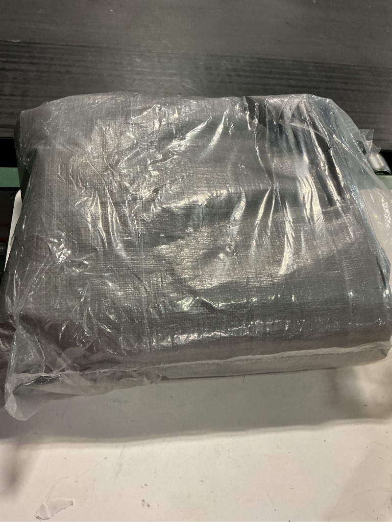 Condition photo showing Good Condition for ozark trail 9' x 12' heavy-duty weather resistant tarpaulin with reinforced corners and grommets
