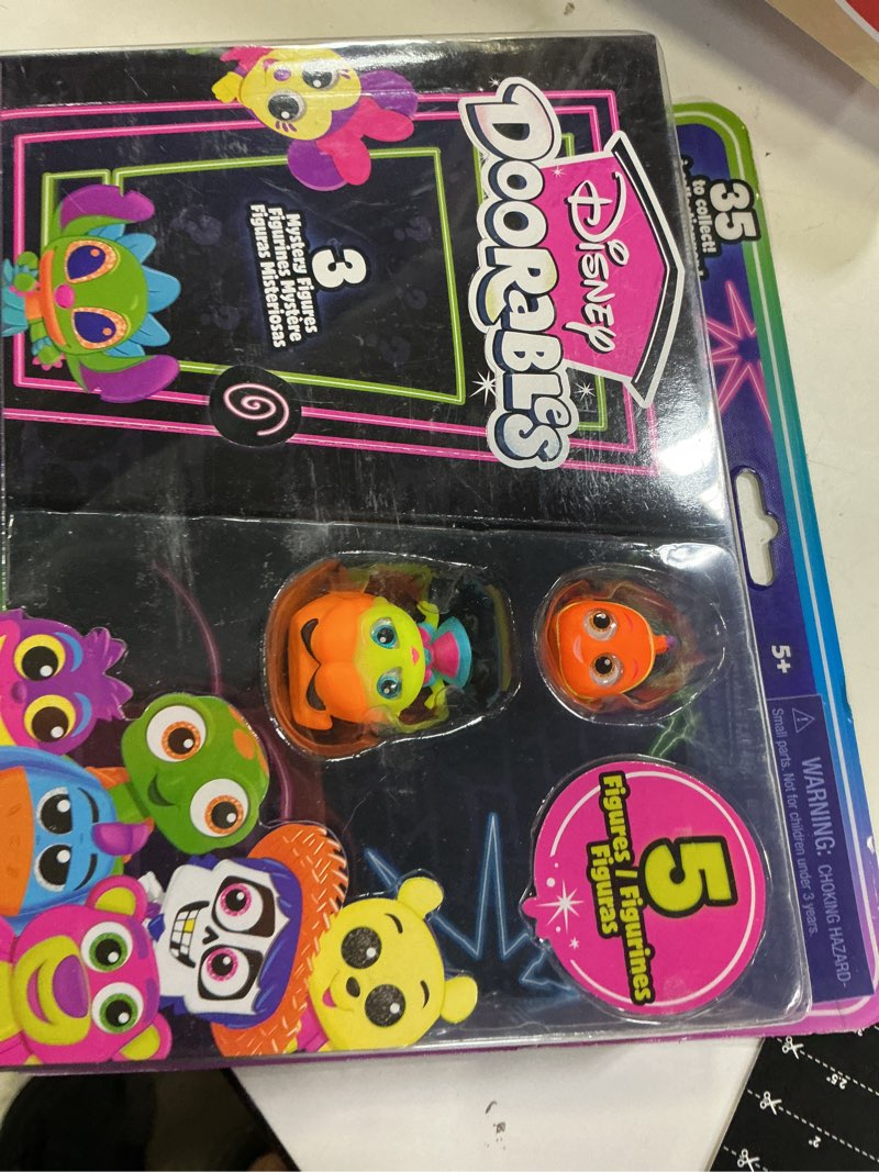 Condition photo showing Good Condition for disney doorables neon glow peek
