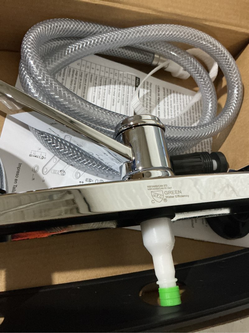 Condition photo showing As Is for project source dover chrome double handle deck-mount kitchen faucet (includes deck plate) (includes side sprayer)