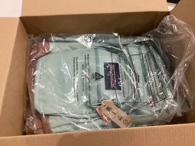 Condition photo showing New/Like New for jansport cool backpack with 15-inch laptop sleeve, large computer bag rucksack with 2 compartments, ergonomic straps, faded sage faded sage one size