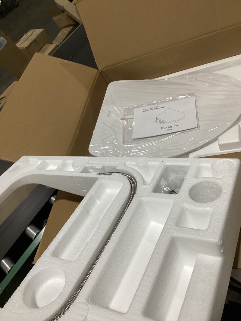 Condition photo showing New/Like New for heated smart toilet seat with feminine wash & dryer, elongated bidet with adjustable water temperature, pressure & nozzle position, easy installation & soft-close lid for modern bathrooms side control
