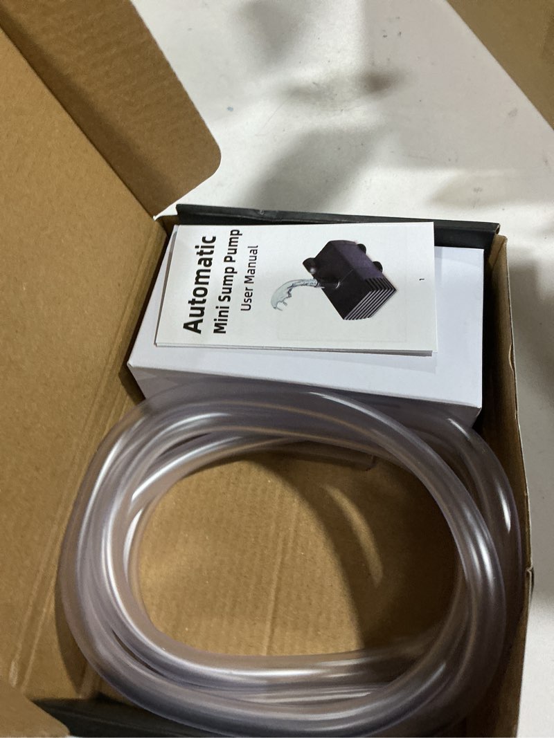 Condition photo showing As Is for automatic small sump pump with water sensor, 8 ft lift 74 gph with 6 ft tubing, 115/230v mini hvac condensate removal pump with float switch for dehumidifier, air conditioner, hydroponic, auto on off